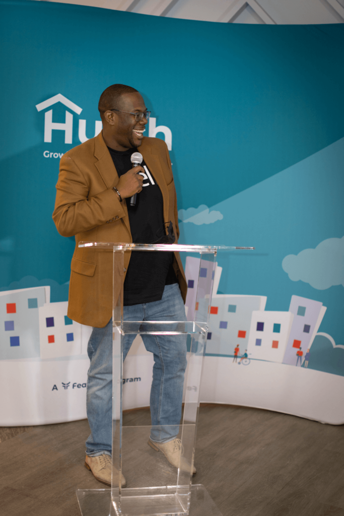 Xcell founder Felix Gilbert speaking at a Hutch graduation in Baltimore, Maryland